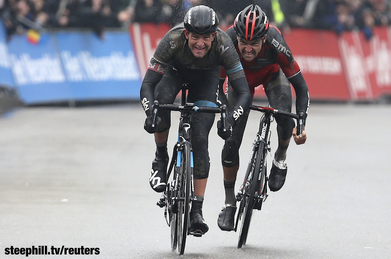 Sky team rider Stannard crosses the finish line to win the Omloop Het Nieuwsblad cycling race ahead of BMC Racing team rider Van Avermaet in Ghent
